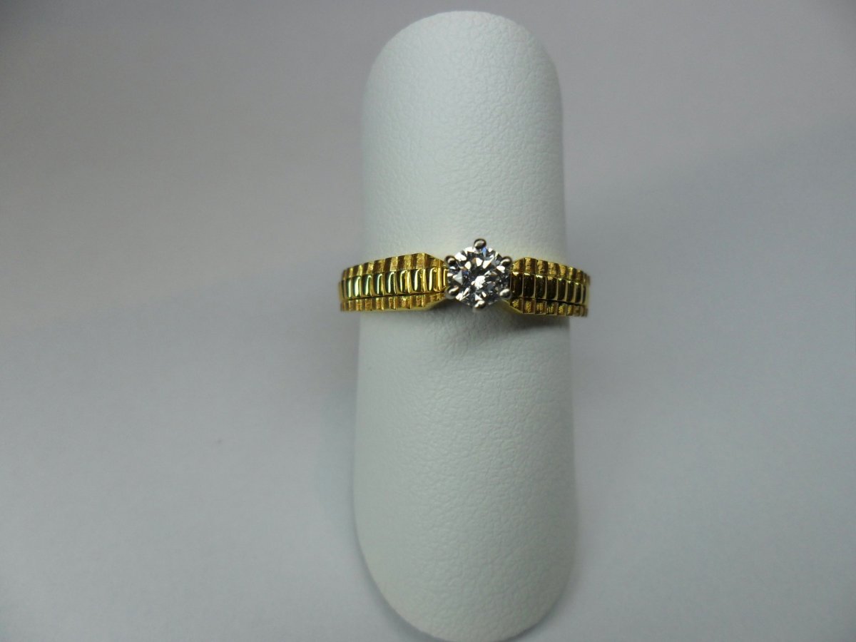 Rolex solitaire ring